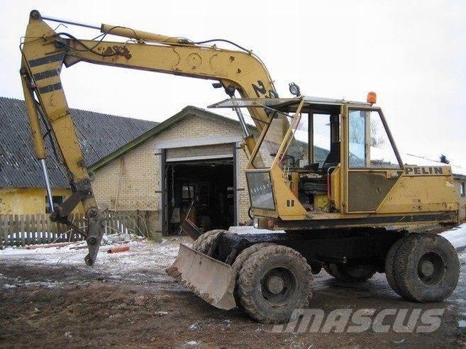 CAT 212 til ophug Kāpurķēžu ekskavatori