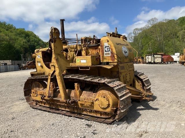 CAT 571G Strēles un kausi