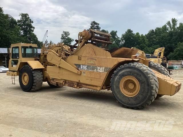 CAT 615C Skrēperi