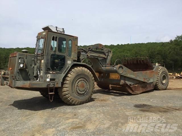 CAT 621B MIL Skrēperi