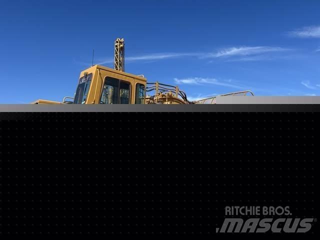 CAT 633E Skrēperi