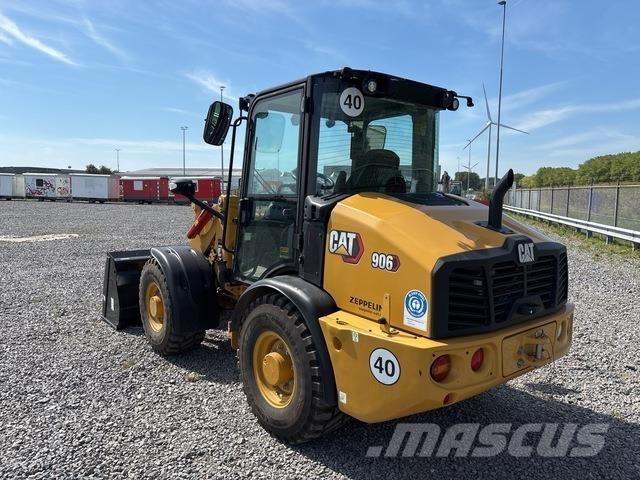CAT 906 Iekrāvēji uz riteņiem