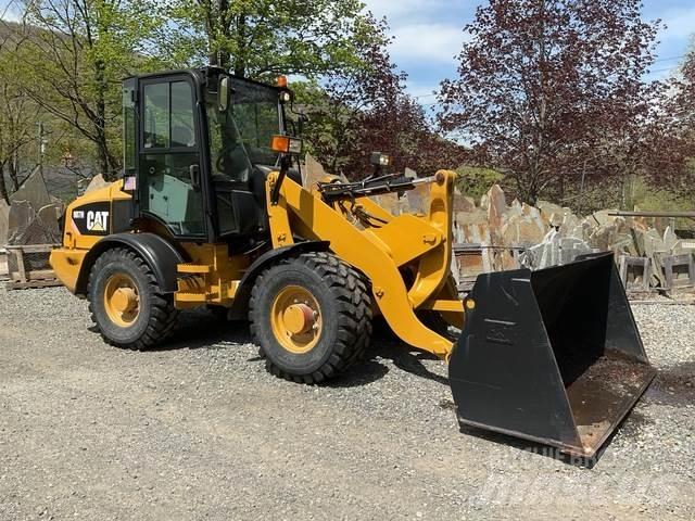 CAT 907H Iekrāvēji uz riteņiem