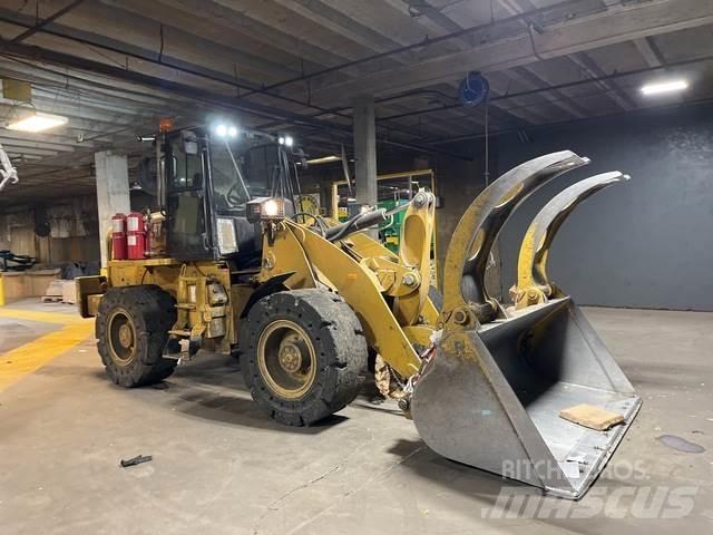 CAT 920 Iekrāvēji uz riteņiem