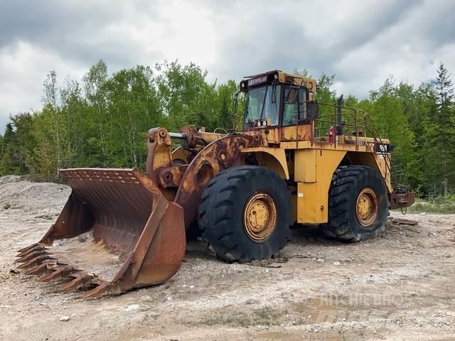 CAT 990 Iekrāvēji uz riteņiem