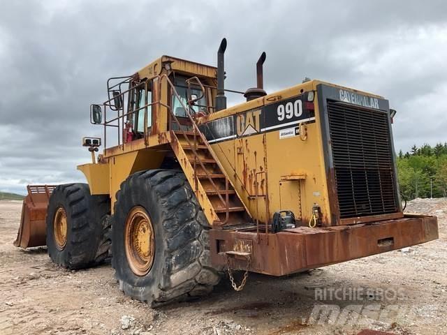 CAT 990 Iekrāvēji uz riteņiem