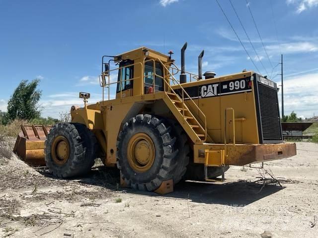 CAT 990 Iekrāvēji uz riteņiem