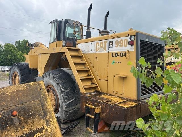 CAT 990 Iekrāvēji uz riteņiem