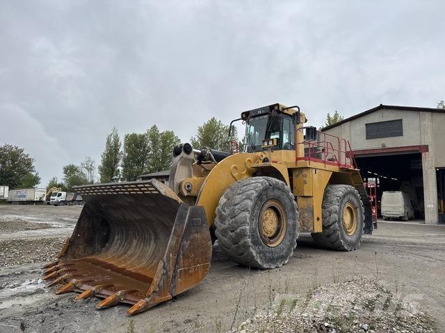 CAT 990 Iekrāvēji uz riteņiem