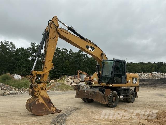CAT M318D Ekskavatori uz riteņiem