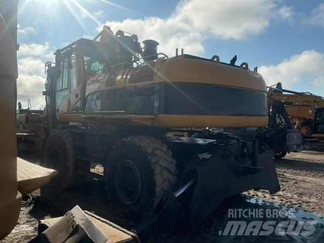 CAT M325CMH Baļķu iekrāvēji