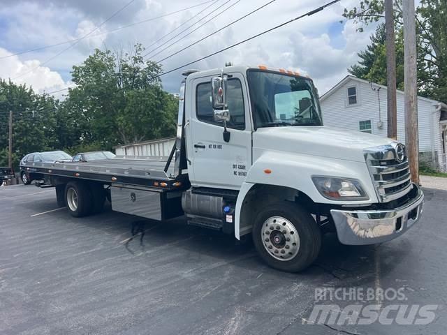 Hino  Evakuators ar manipulatoru