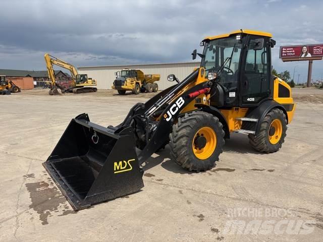 JCB 409 Iekrāvēji uz riteņiem