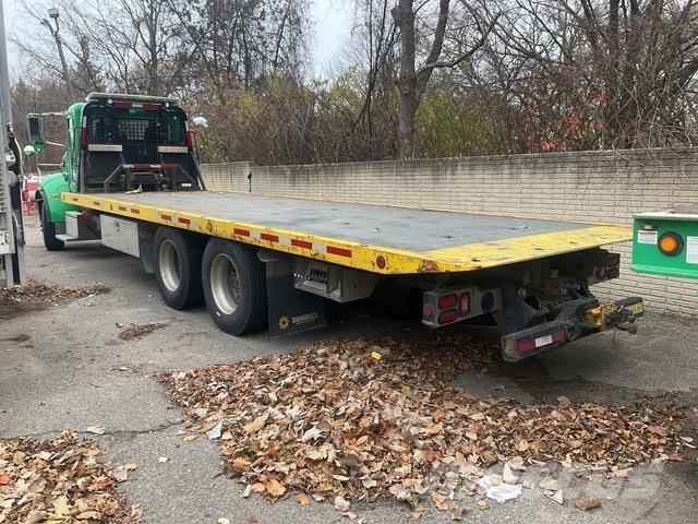 Peterbilt 348 Evakuators ar manipulatoru