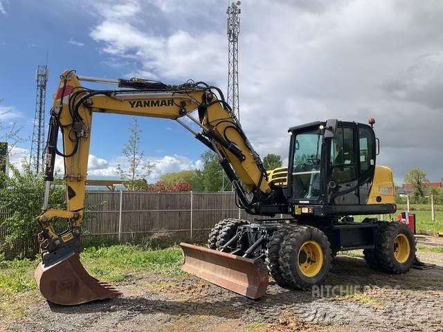 Yanmar B110W Ekskavatori uz riteņiem