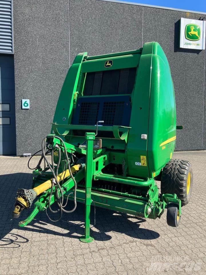 John Deere 864 Rituļu preses
