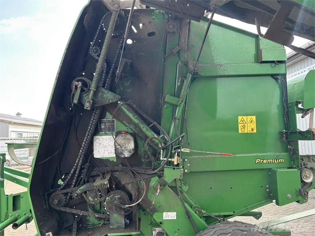 John Deere 864 Rituļu preses