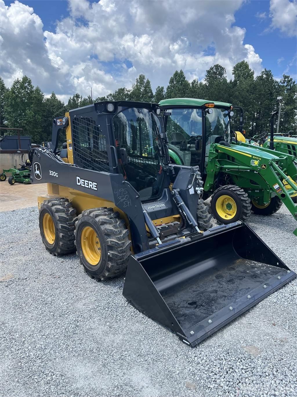 John Deere 320G Lietoti riteņu kompaktiekrāvēji