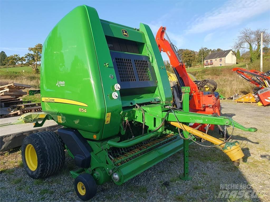 John Deere 854 Rituļu preses