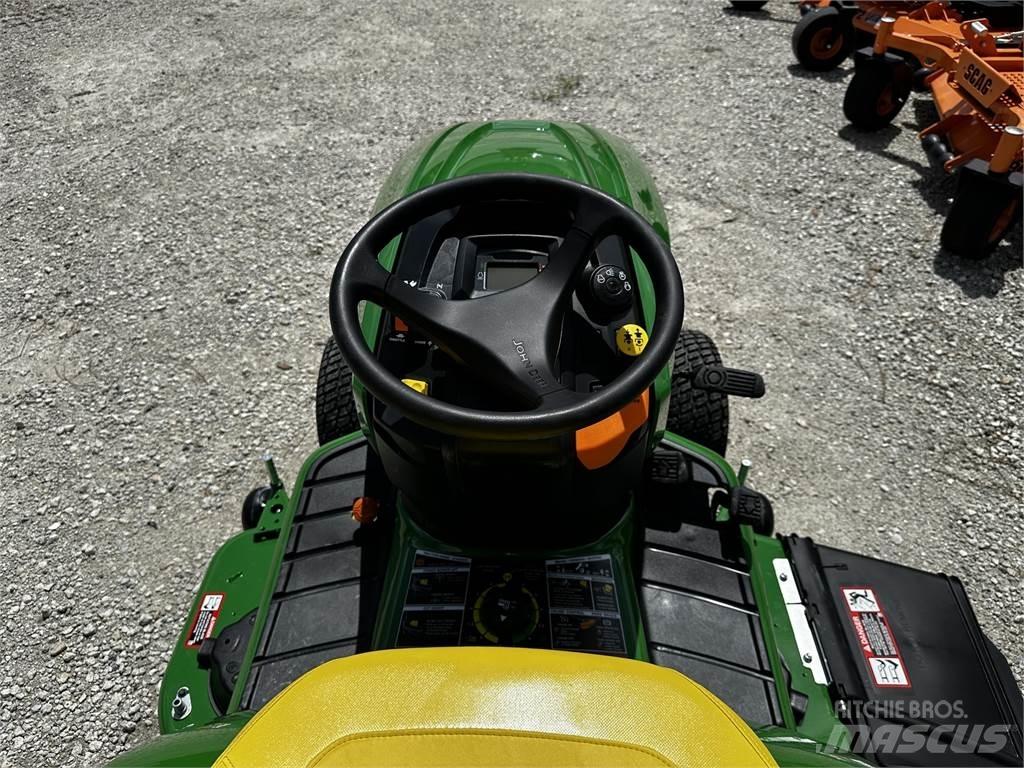 John Deere X584 Kompaktie traktori