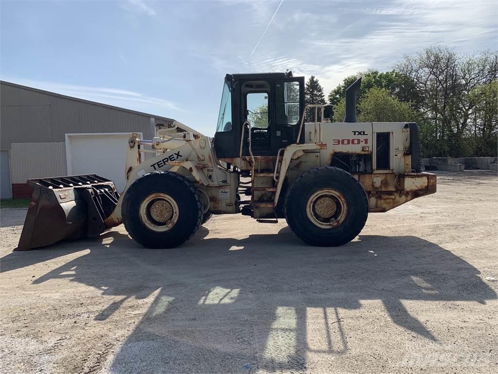 Terex TXL300 Iekrāvēji uz riteņiem