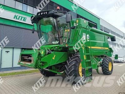 John Deere W540 2WD Ražas novākšanas kombaini