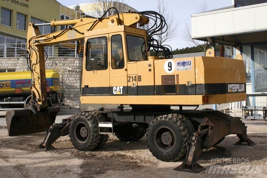 CAT 214B Ekskavatori uz riteņiem