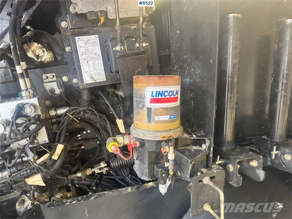 CASE RB545 Cita ražas novākšanas tehnika