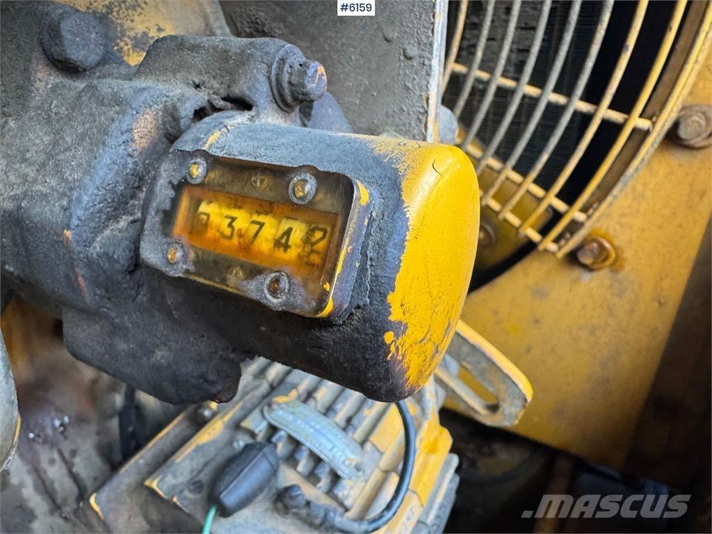 CAT 950 Iekrāvēji uz riteņiem