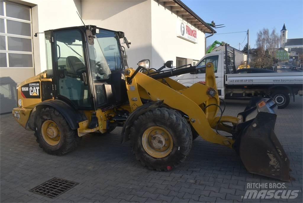 CAT 906M Iekrāvēji uz riteņiem