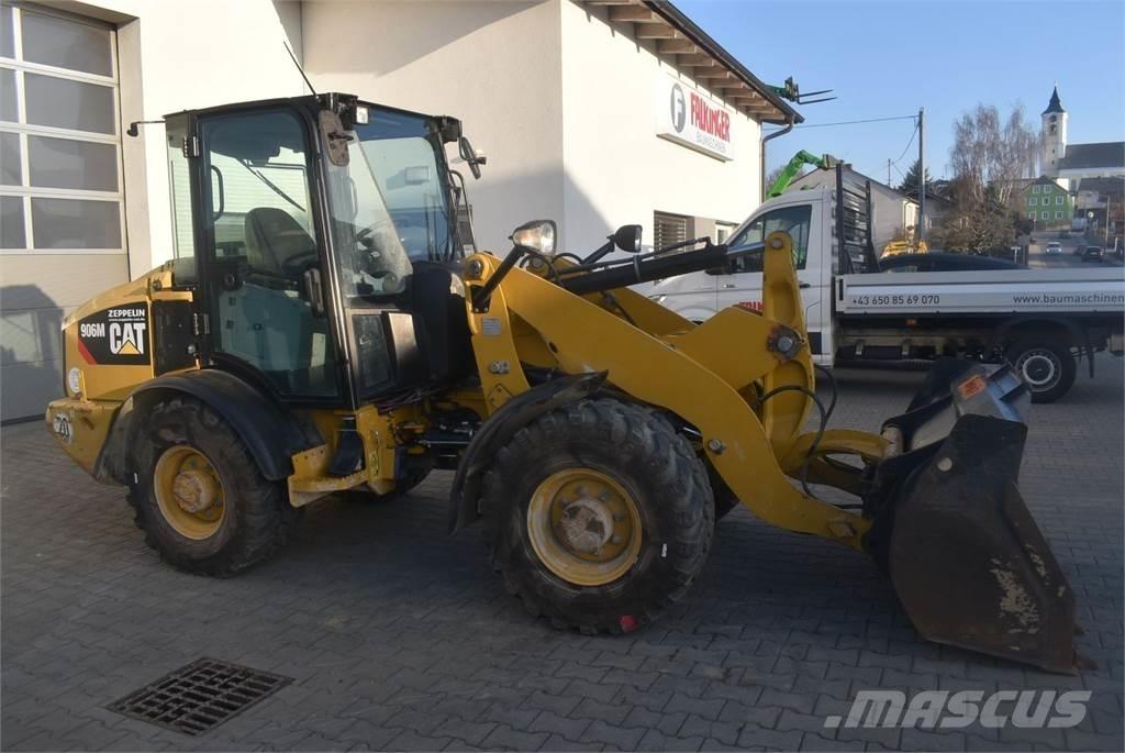 CAT 906M Iekrāvēji uz riteņiem
