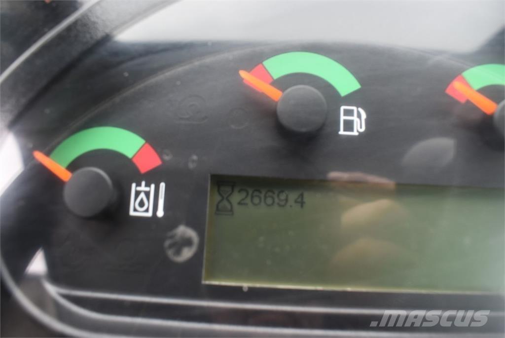 CAT 906M Iekrāvēji uz riteņiem