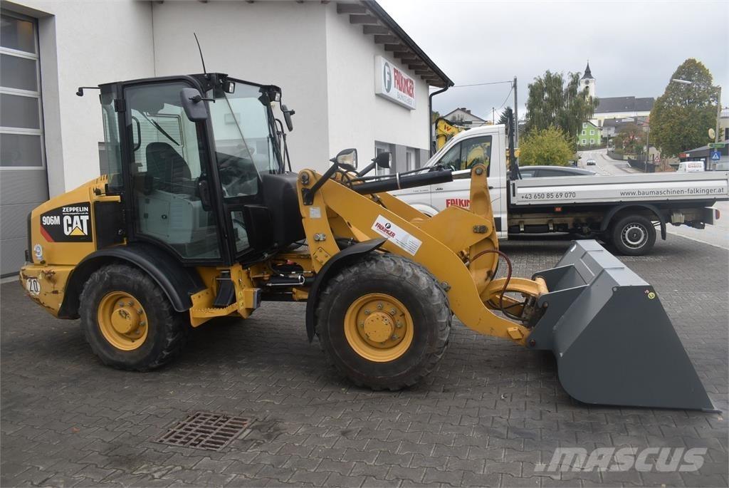 CAT 906M Iekrāvēji uz riteņiem