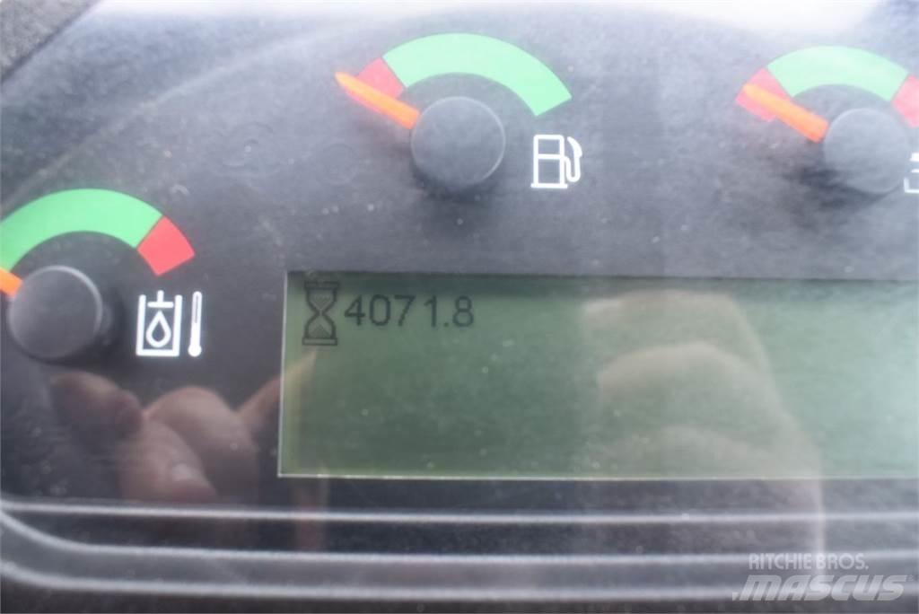 CAT 907M Iekrāvēji uz riteņiem