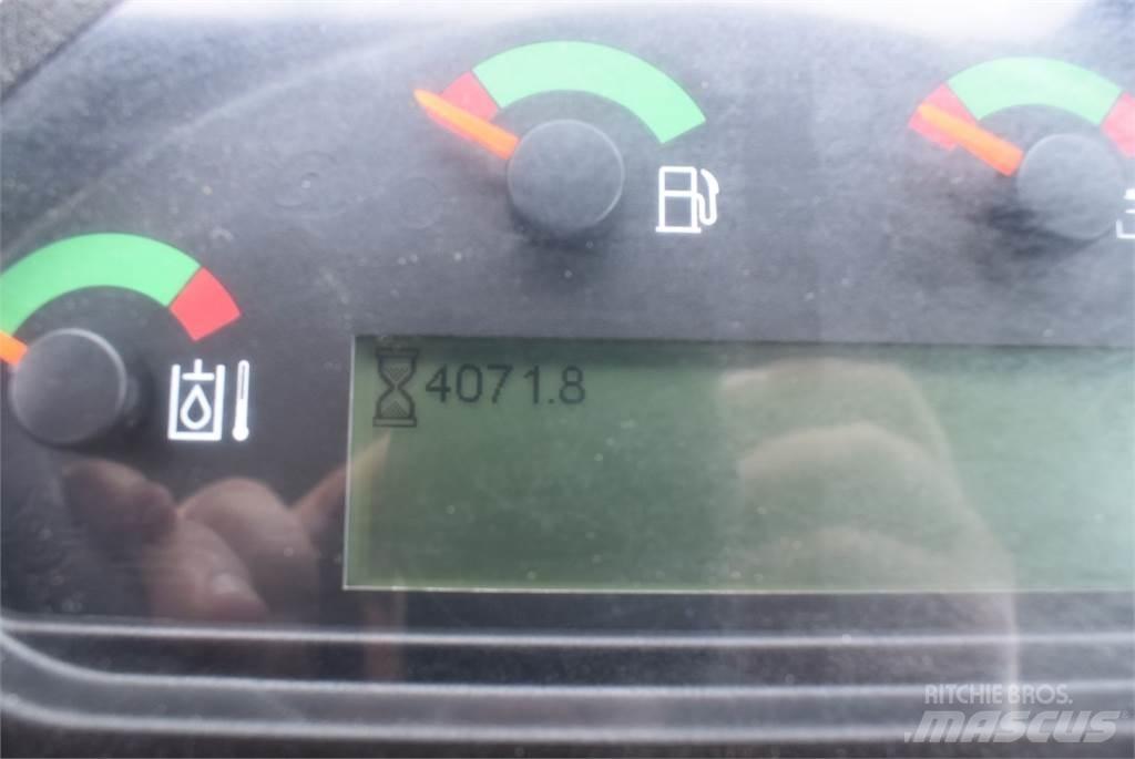 CAT 907M Iekrāvēji uz riteņiem