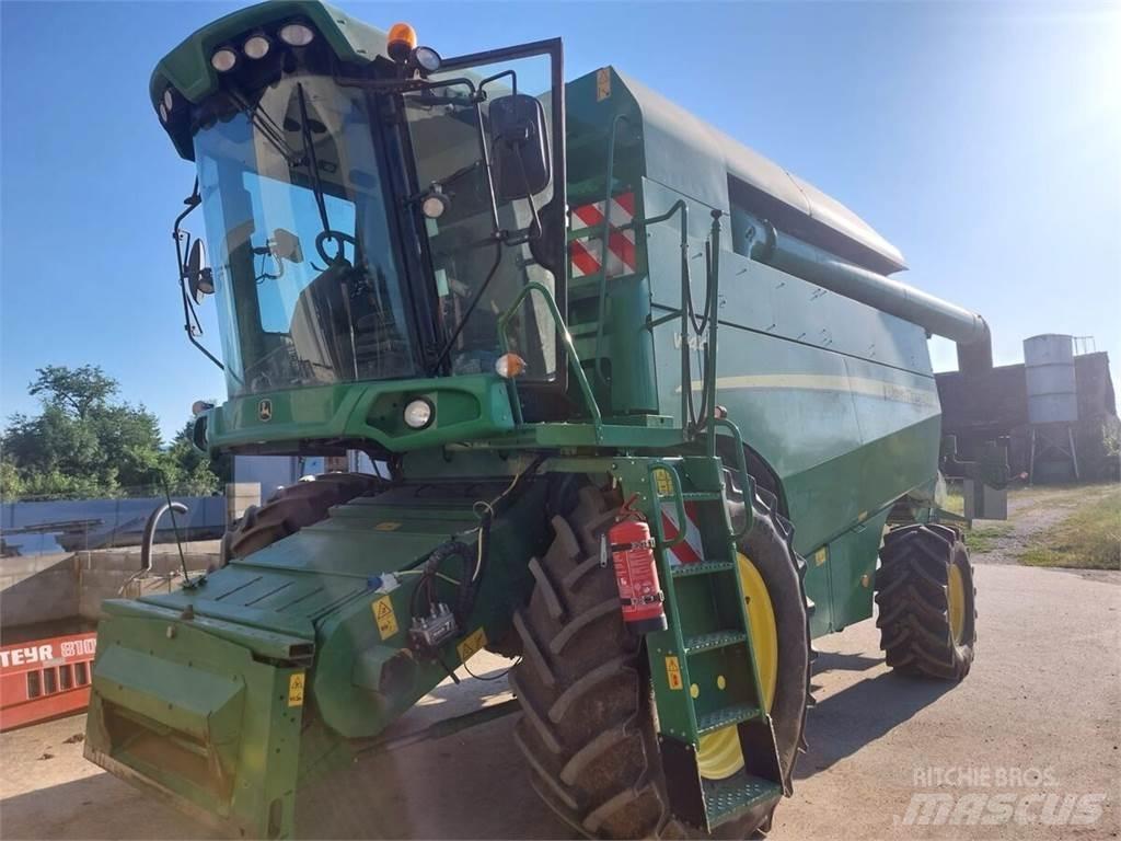 John Deere W440 Ražas novākšanas kombaini