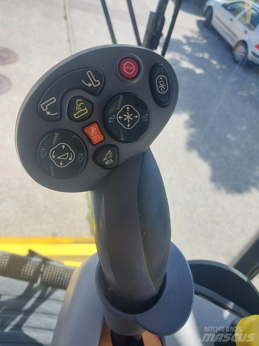 New Holland TC5070 Ražas novākšanas kombaini