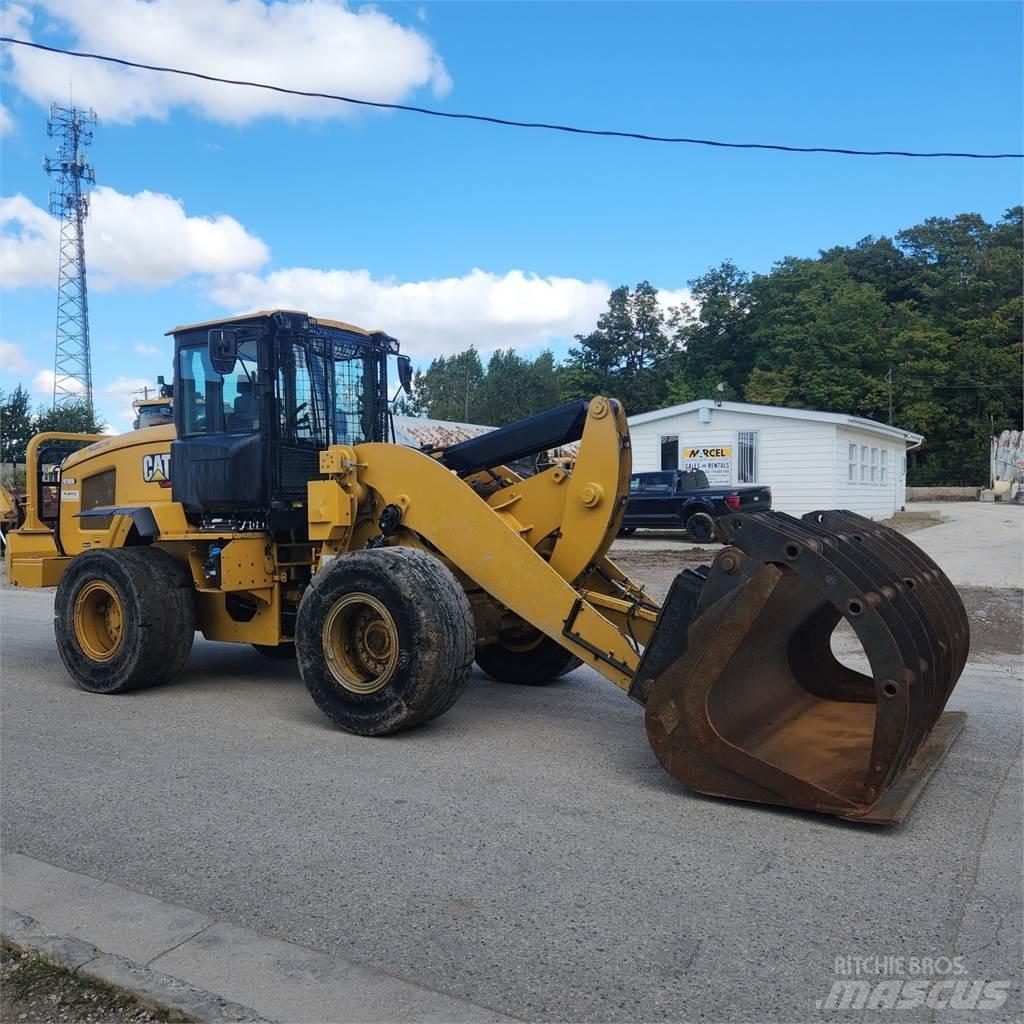 CAT 938M Iekrāvēji uz riteņiem