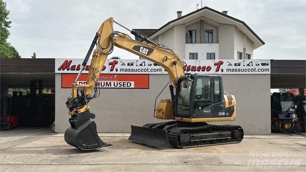 CAT 311D Vidēja lieluma ekskavatori 7 t - 12 t