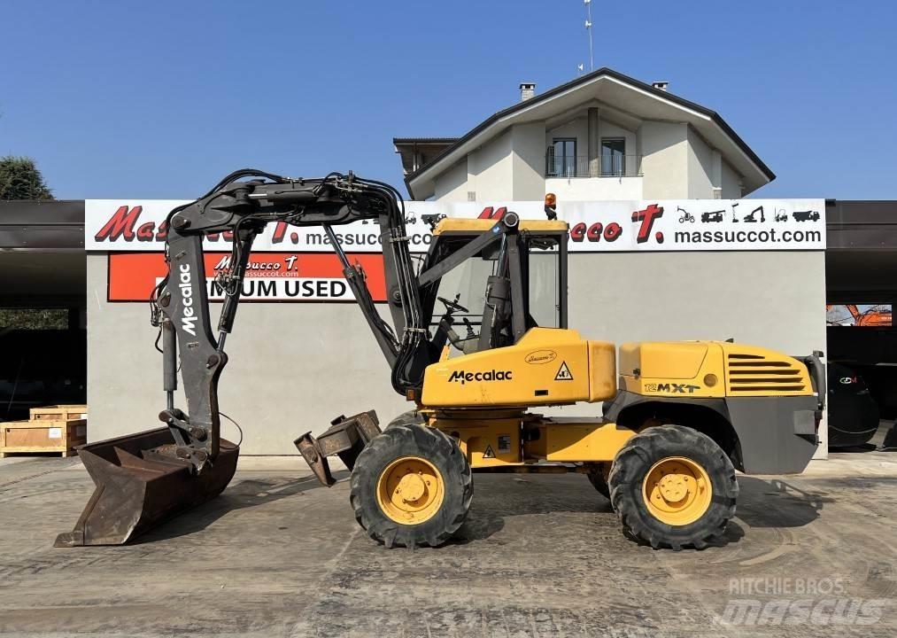 Mecalac 12MXT-E Ekskavatori uz riteņiem