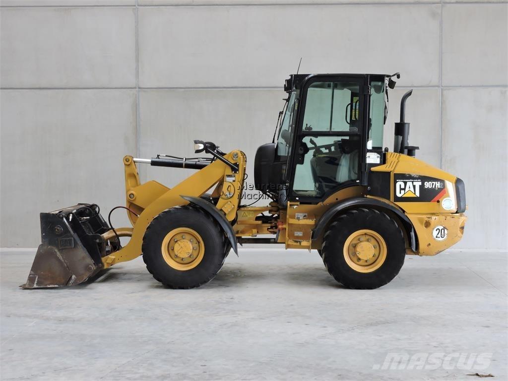 CAT 907H Iekrāvēji uz riteņiem