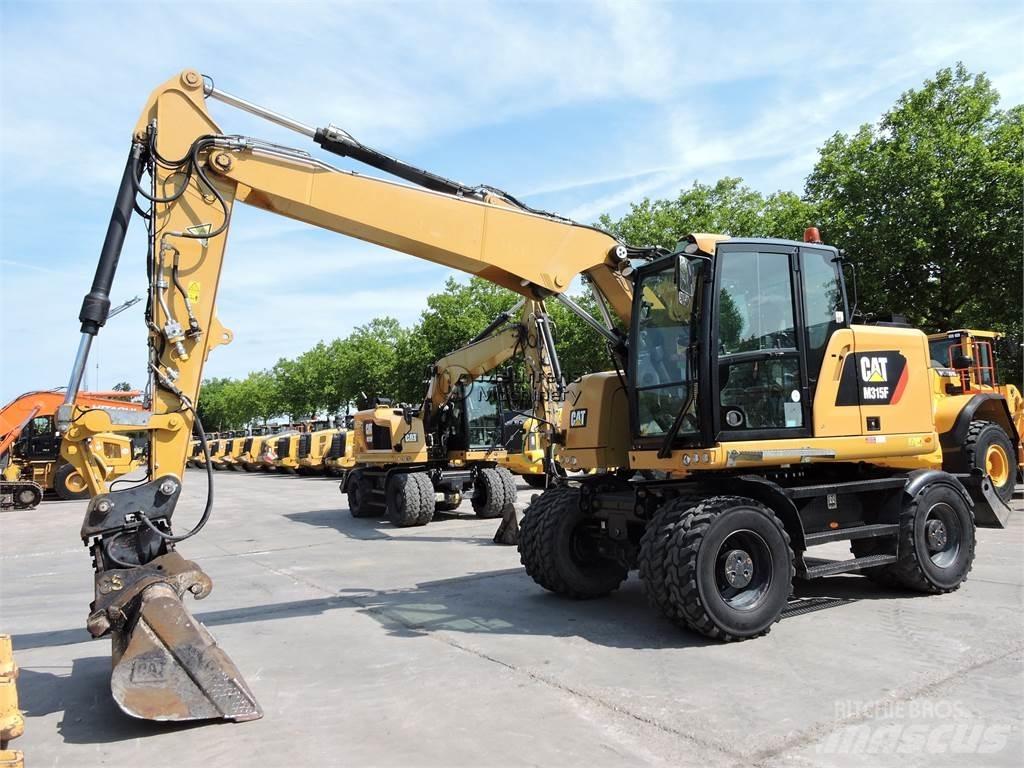CAT M315 Ekskavatori uz riteņiem