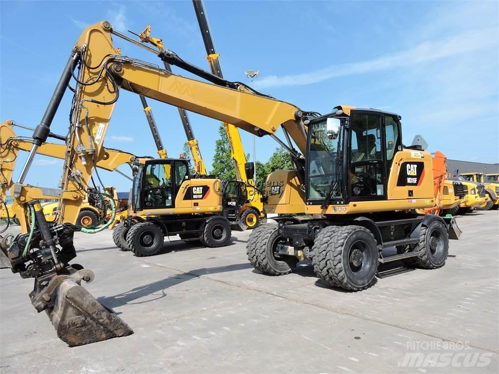 CAT M315 Ekskavatori uz riteņiem