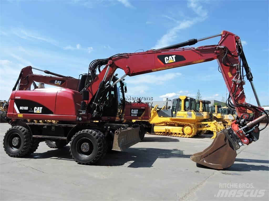 CAT M316D ROTOTILT Ekskavatori uz riteņiem