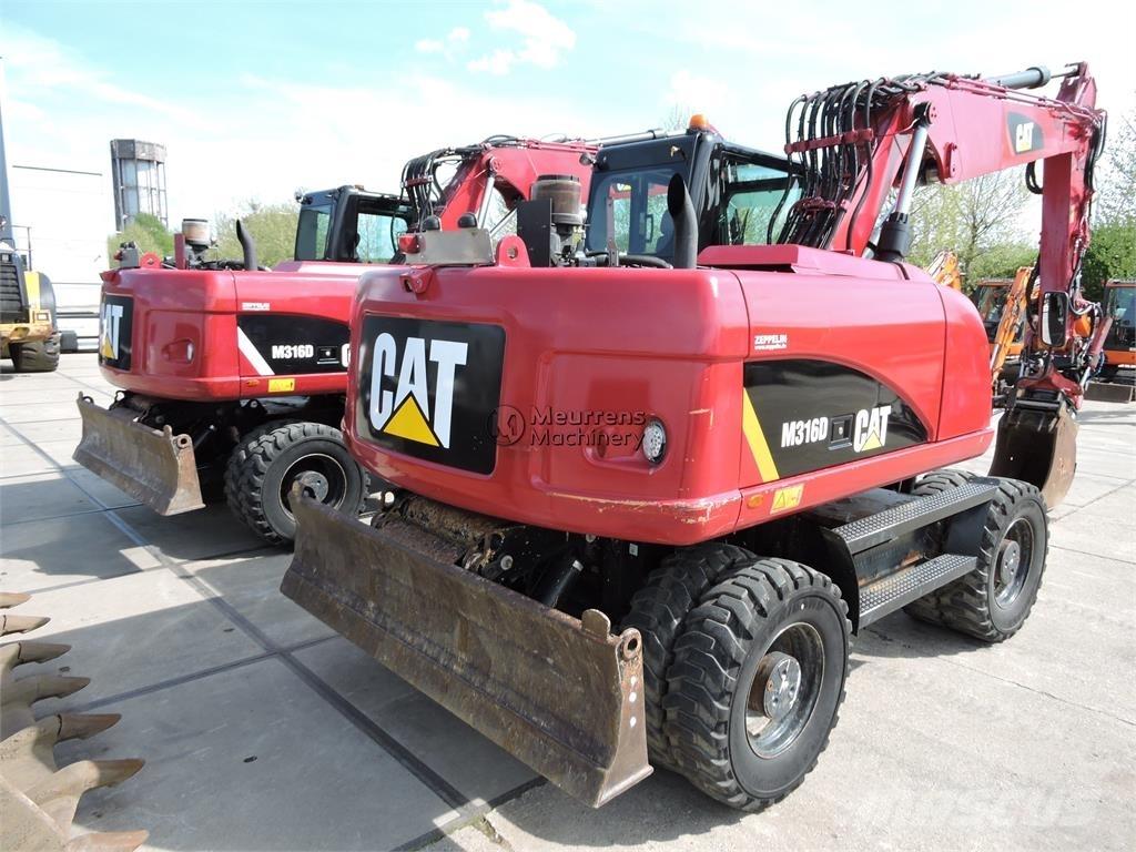 CAT M316D ROTOTILT Ekskavatori uz riteņiem