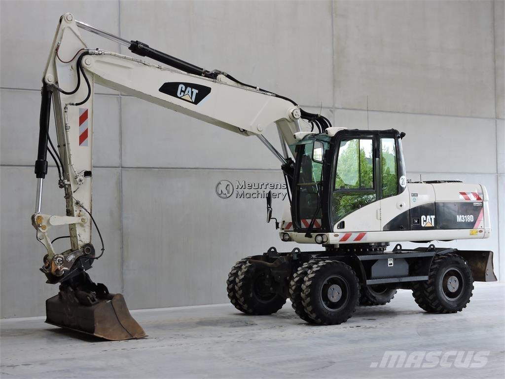 CAT M318D Ekskavatori uz riteņiem