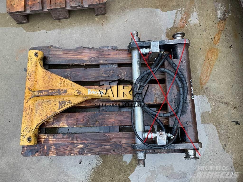 CAT 907 H Strēles un kausi