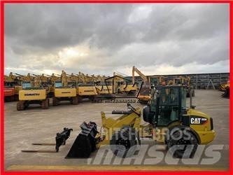 CAT 908M Iekrāvēji uz riteņiem
