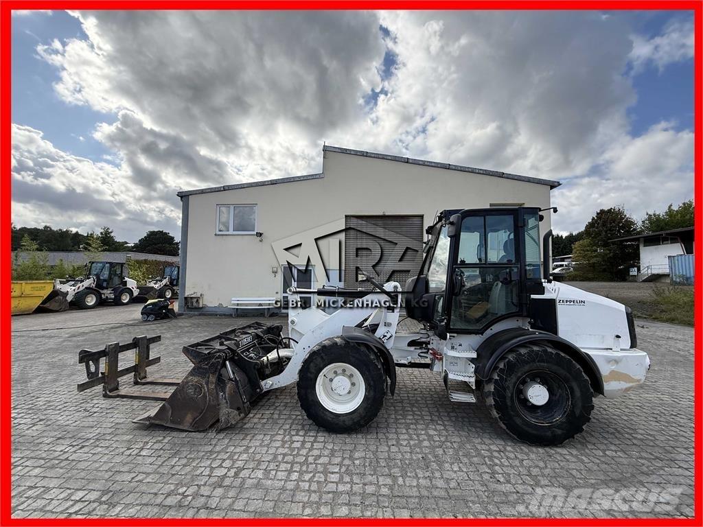CAT 908M Iekrāvēji uz riteņiem