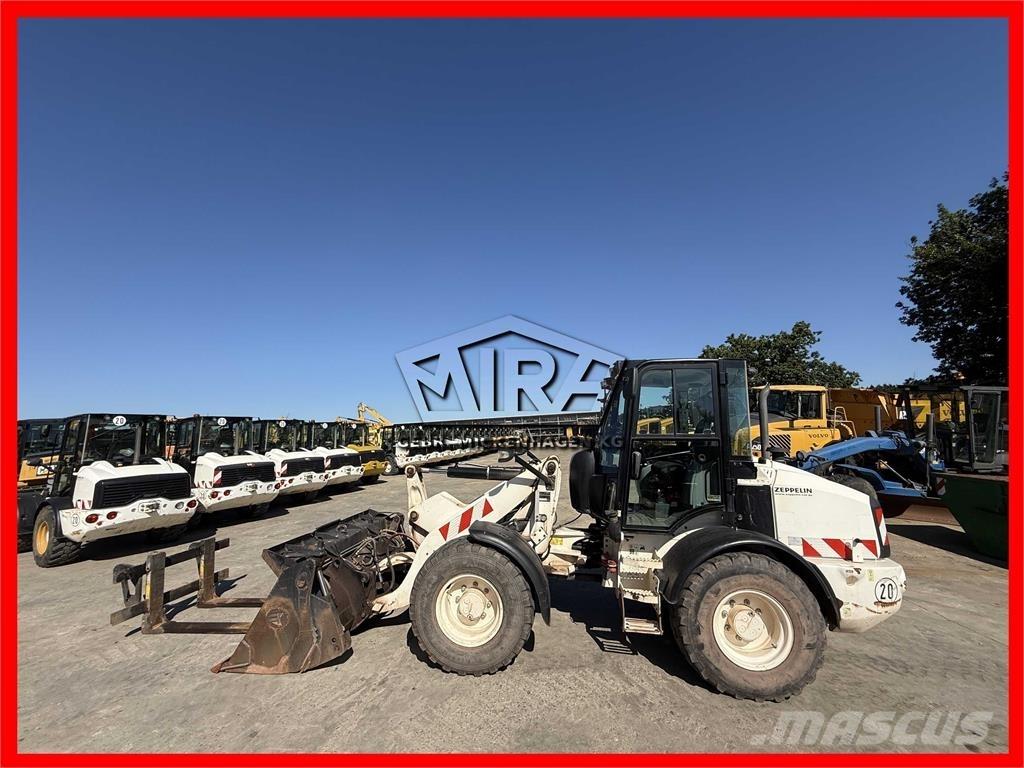 CAT 908M Iekrāvēji uz riteņiem